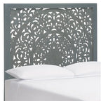 Tête de lit Home Remedy grise avec motif découpé en noyer