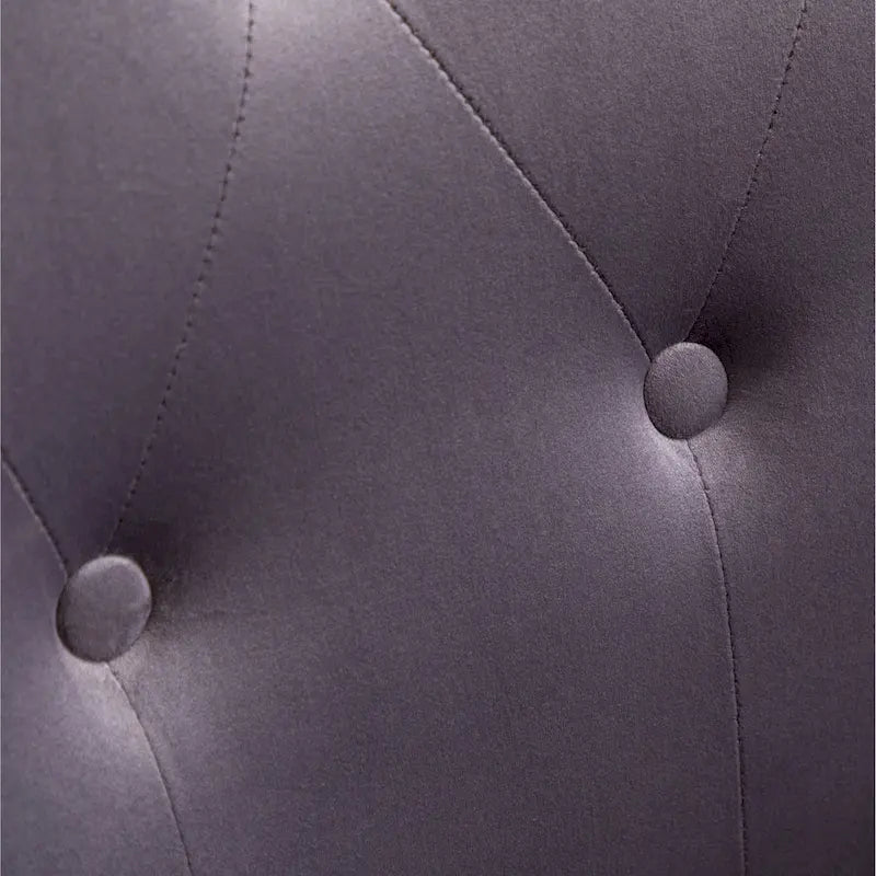 Fauteuil d'appoint en velours à dossier haut et capitonné