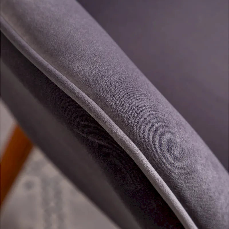 Fauteuil d'appoint en velours à dossier haut et capitonné