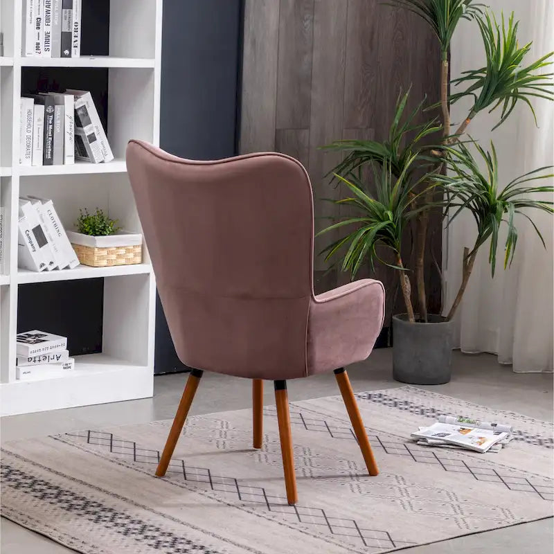 Fauteuil d'appoint en velours à dossier haut et capitonné
