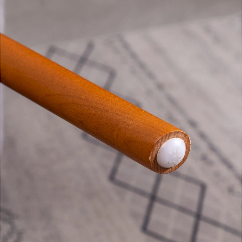 Fauteuil d'appoint en velours à dossier haut et capitonné